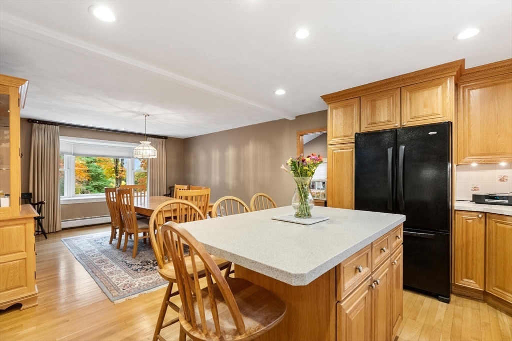 31 Girard Road Winchester, MA 01890 - Photo 14 of 38 a view of a dining room with furniture window and wooden floor