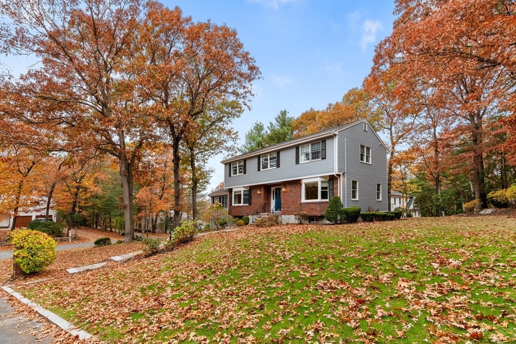 31 Girard Road Winchester, MA 01890 - Photo 2 of 38 a view of a house with a snow in the yard