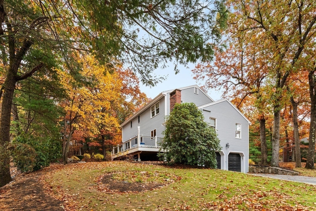 31 Girard Road Winchester, MA 01890 - Photo 34 of 38 a view of a house with a yard