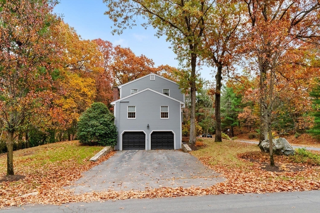 31 Girard Road Winchester, MA 01890 - Photo 35 of 38 a view of a house with a yard