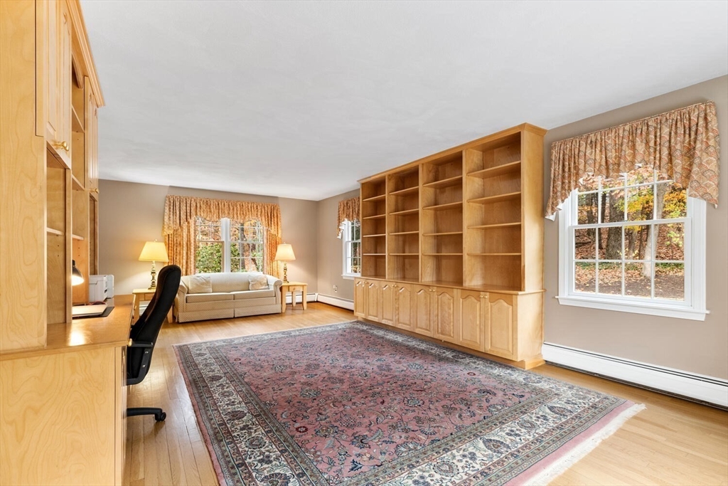 31 Girard Road Winchester, MA 01890 - Photo 6 of 38 a living room with furniture and a window