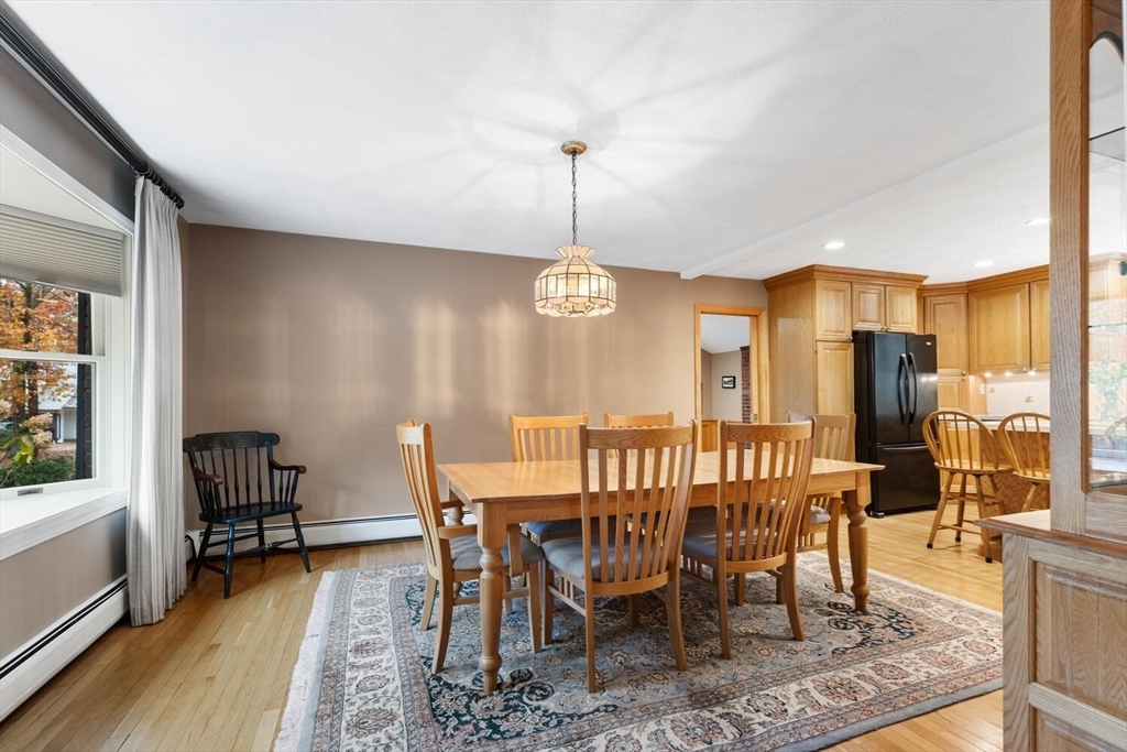 31 Girard Road Winchester, MA 01890 - Photo 9 of 38 a view of a dining room with furniture window and wooden floor