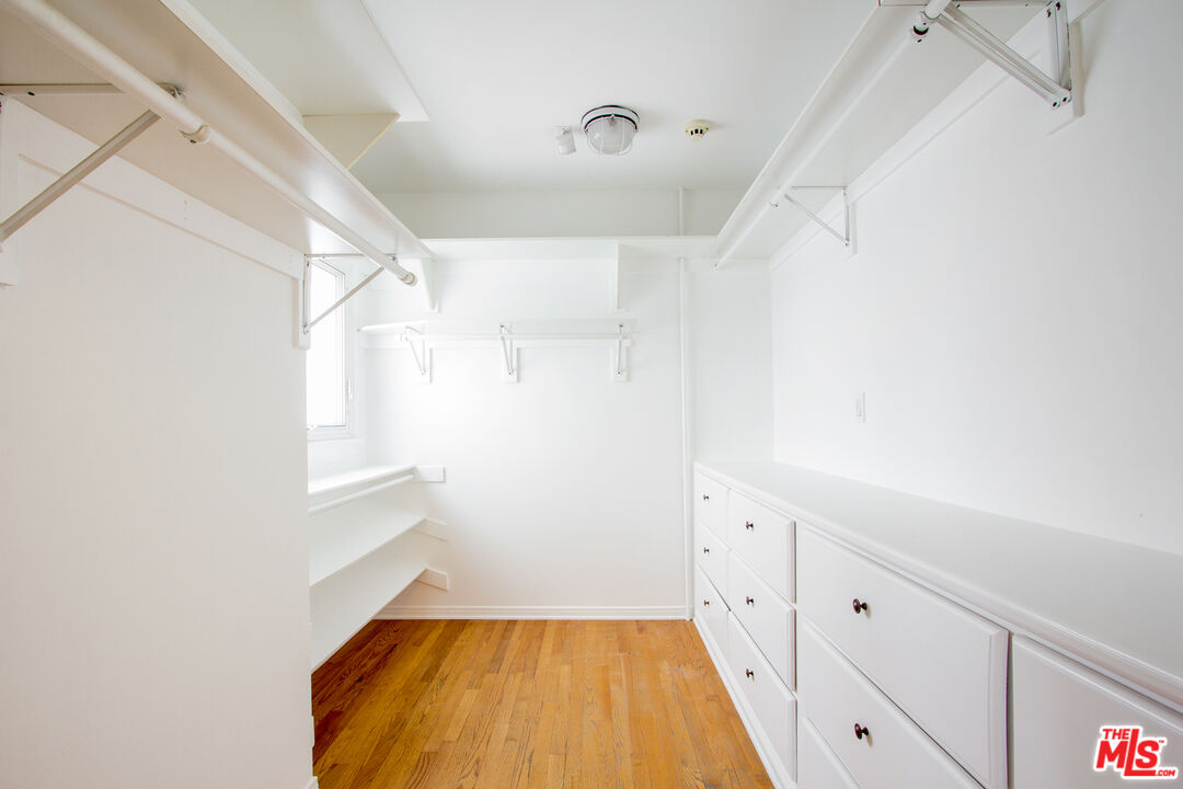 1244 Stradella Road Los Angeles, CA 90077 - Photo 12 of 18 a bathroom with a sink and a shower