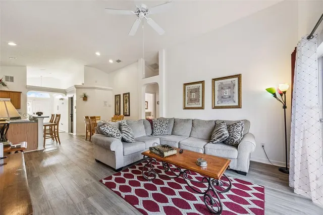 a living room with furniture and a rug