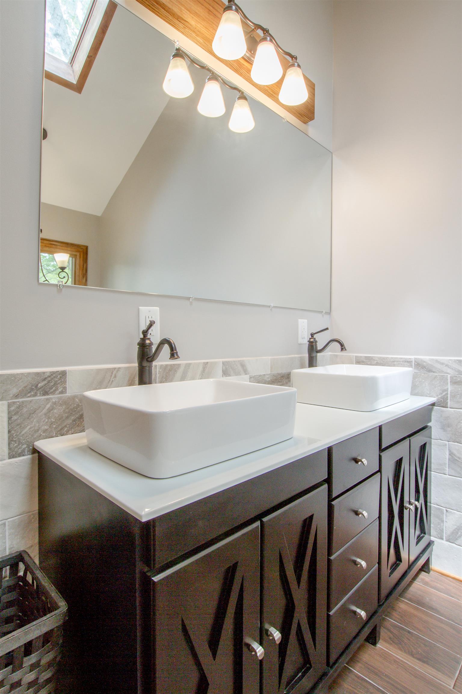 6353 Morton Road Greenbrier, TN 37073 - Photo 23 of 30 a bathroom with a sink and a mirror