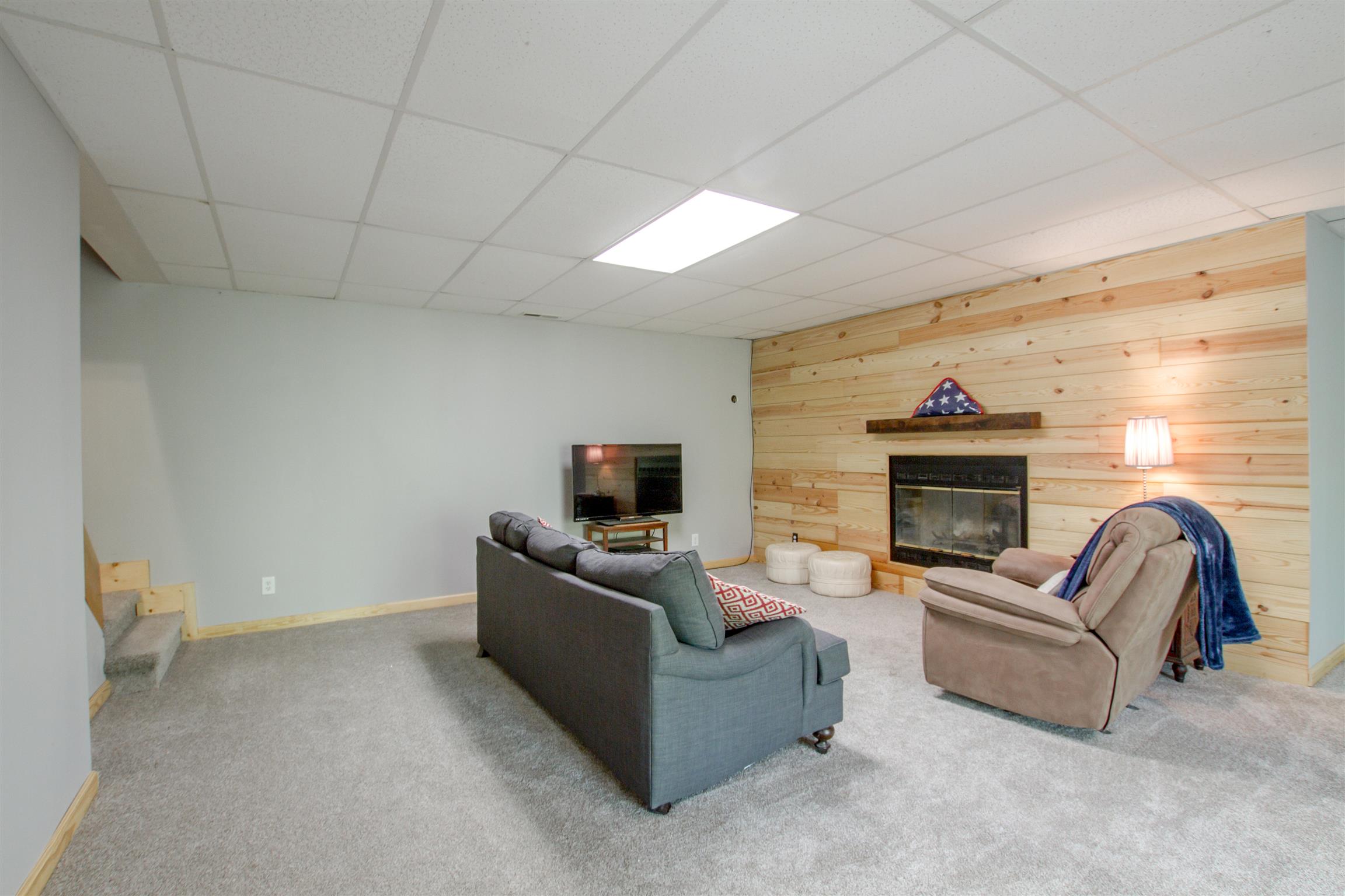 6353 Morton Road Greenbrier, TN 37073 - Photo 24 of 30 a living room with furniture and a fireplace