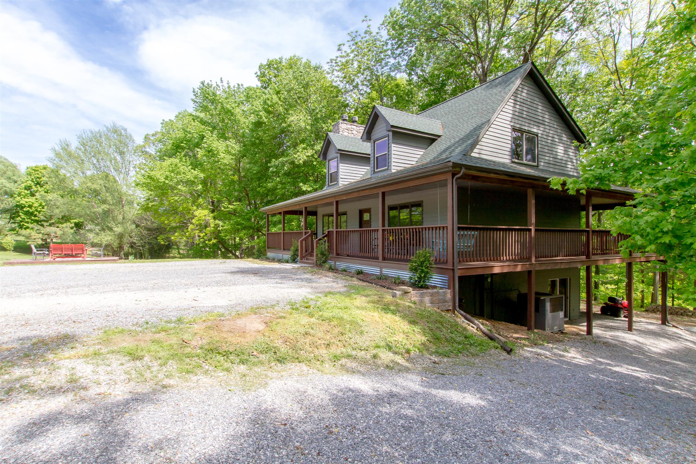 6353 Morton Road Greenbrier, TN 37073 - Photo 6 of 30 a front view of a house with a yard and garage