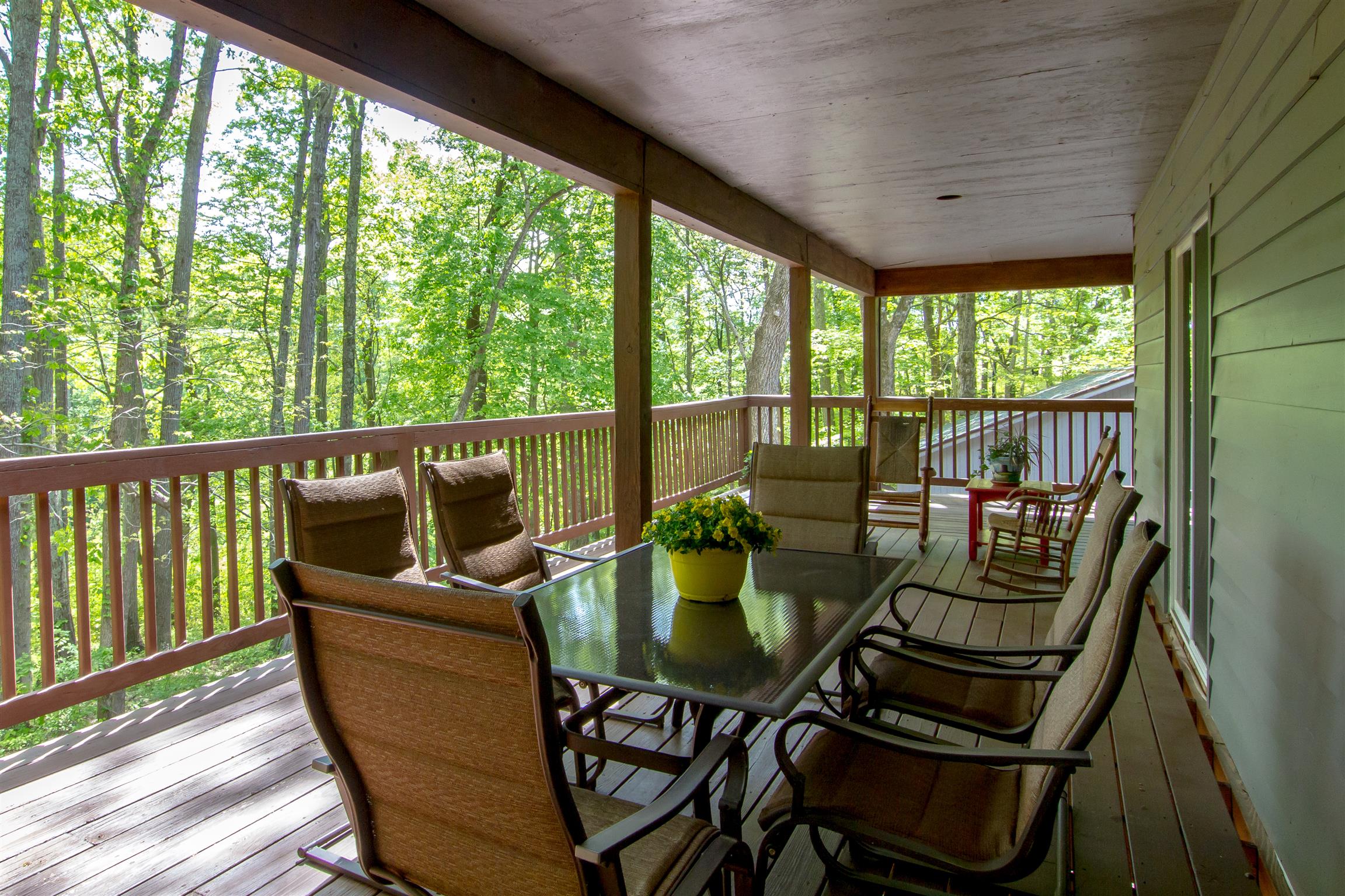 6353 Morton Road Greenbrier, TN 37073 - Photo 9 of 30 a view of a porch with furniture and wooden floor