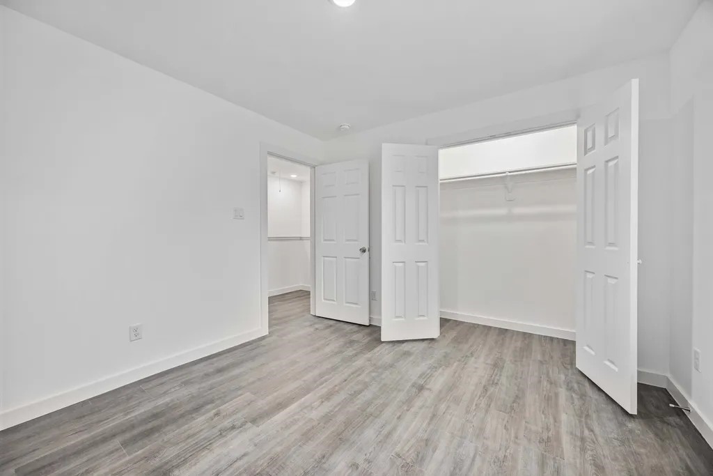 7811 Laura Koppe Road, Unit A Houston, TX 77028 - Photo 16 of 23 a view of an empty room with wooden floor