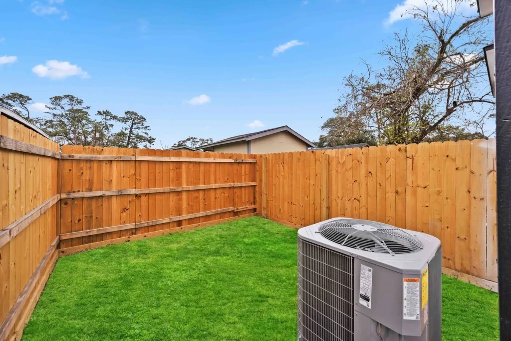 7811 Laura Koppe Road, Unit A Houston, TX 77028 - Photo 20 of 23 a view of backyard with wooden fence