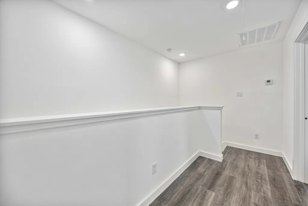 7811 Laura Koppe Road, Unit A Houston, TX 77028 - Photo 10 of 23 a view of small space with wooden floor