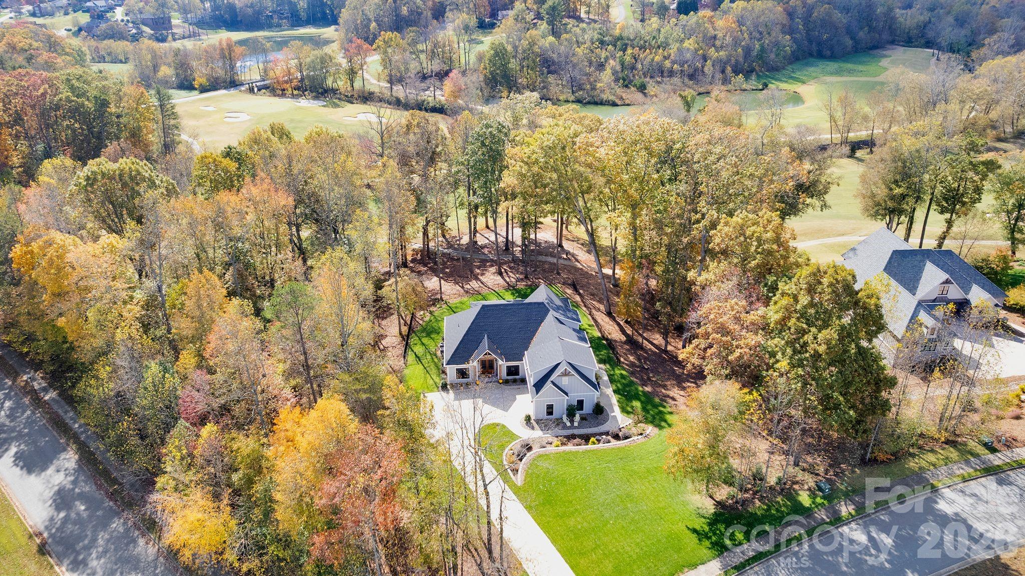 4111 Ridge Drive Northeast Conover, NC 28613 - Photo 2 of 39 a view of swimming pool with lawn chairs and wooden fence