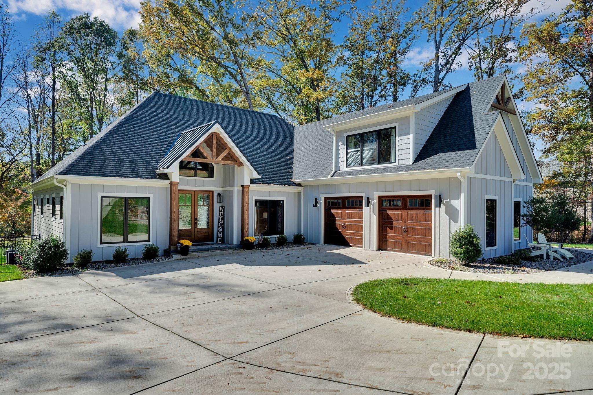 4111 Ridge Drive Northeast Conover, NC 28613 - Photo 2 of 39 a front view of a house with a yard and garage