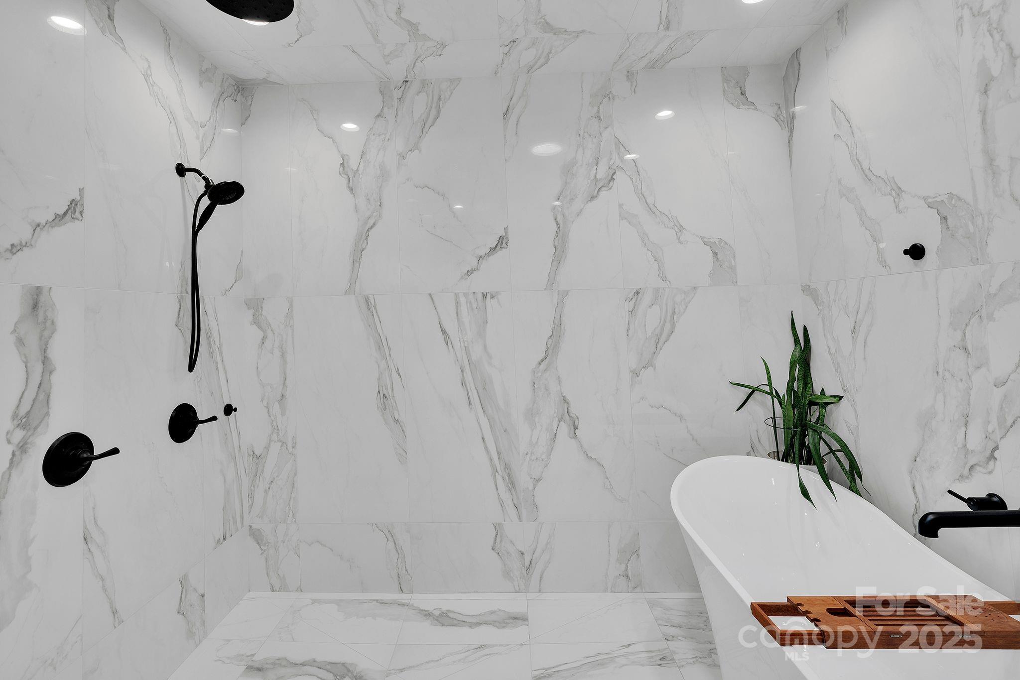 4111 Ridge Drive Northeast Conover, NC 28613 - Photo 24 of 39 a bathroom with a tub sink and mirror