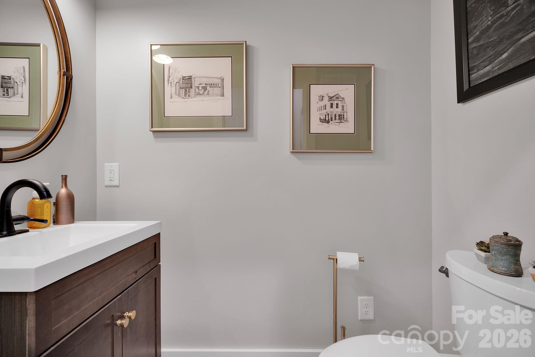 4111 Ridge Drive Northeast Conover, NC 28613 - Photo 28 of 39 a bathroom with a sink mirror and toilet