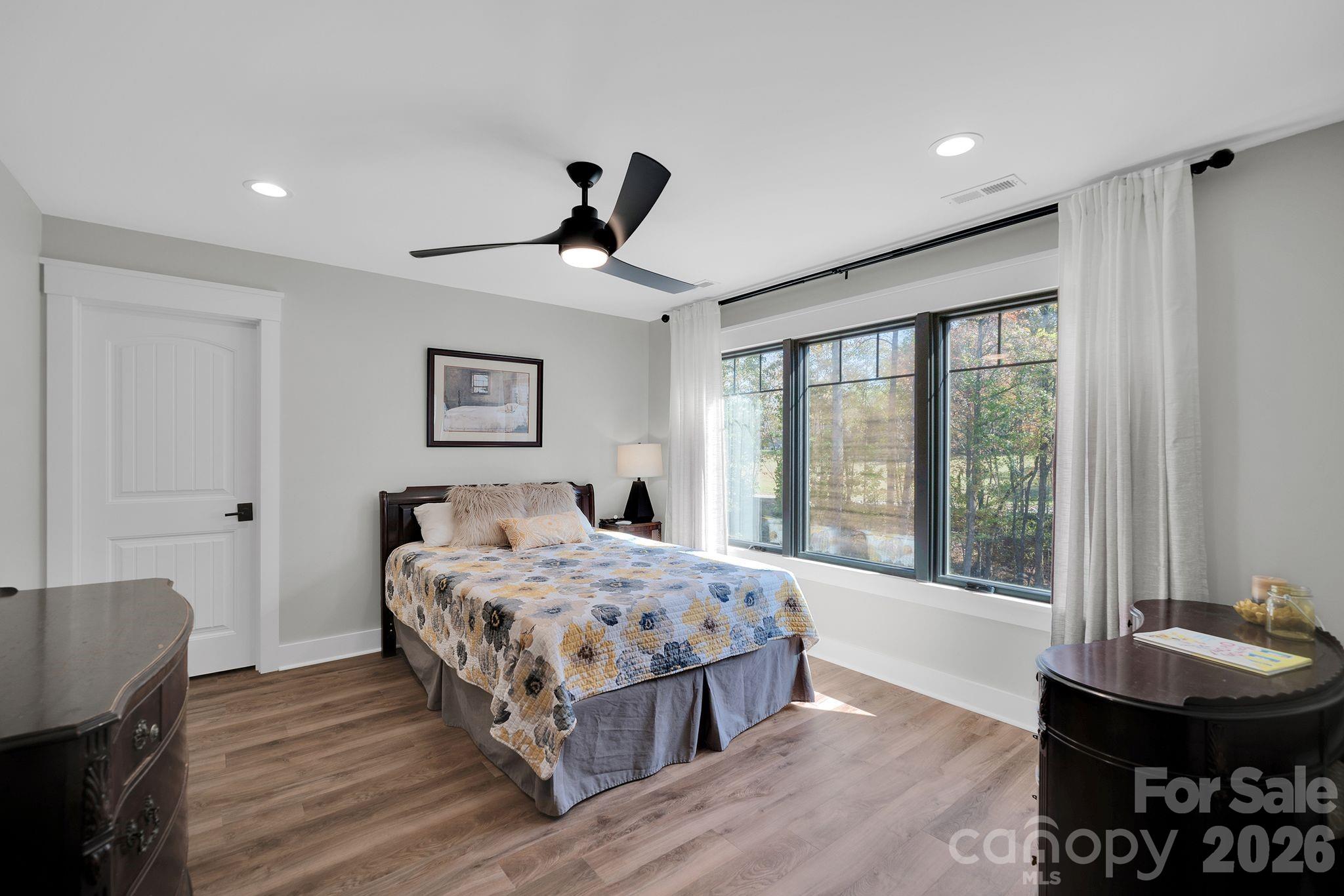 4111 Ridge Drive Northeast Conover, NC 28613 - Photo 31 of 39 a bedroom with a bed and a table