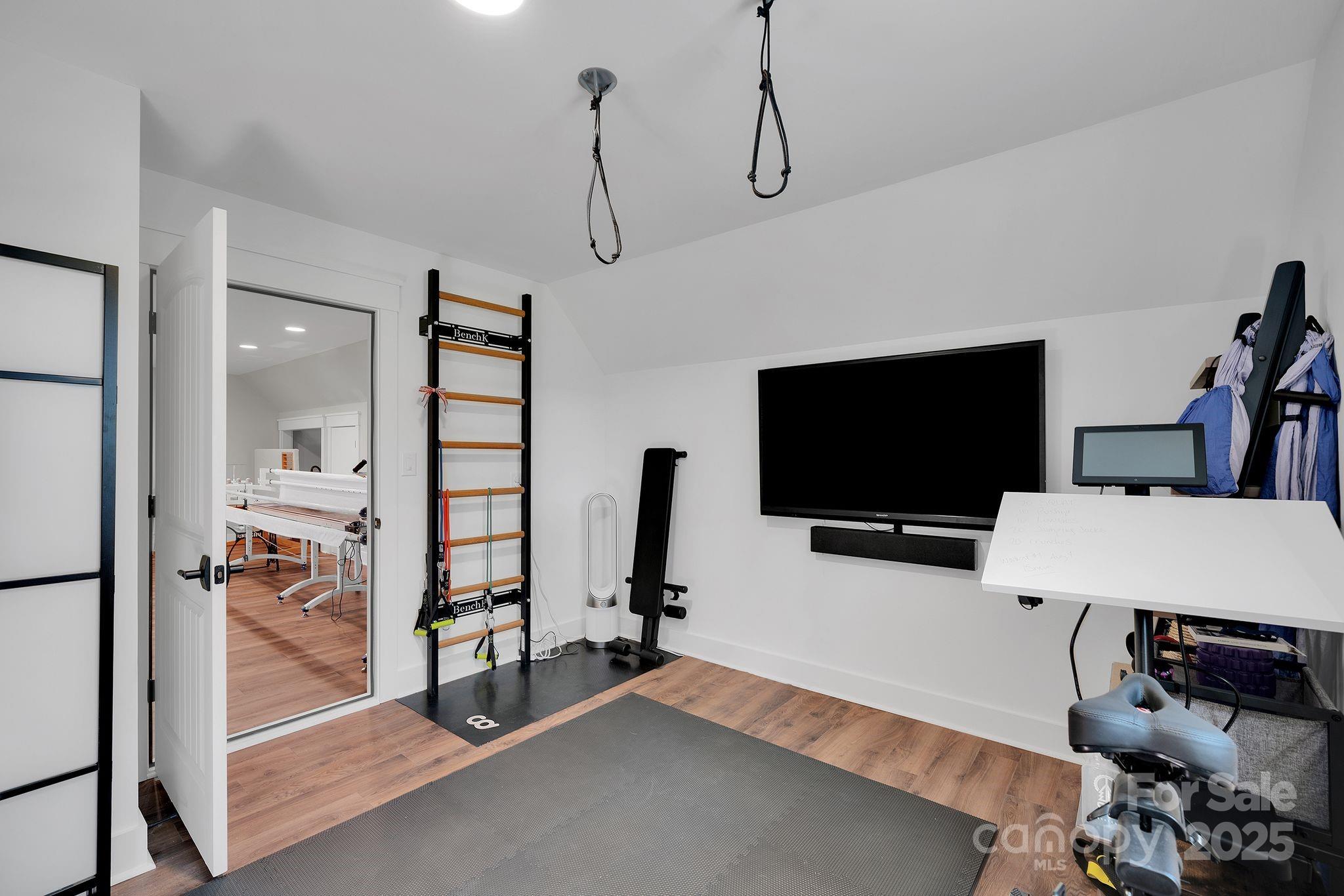 4111 Ridge Drive Northeast Conover, NC 28613 - Photo 34 of 39 a living room with furniture and a flat screen tv