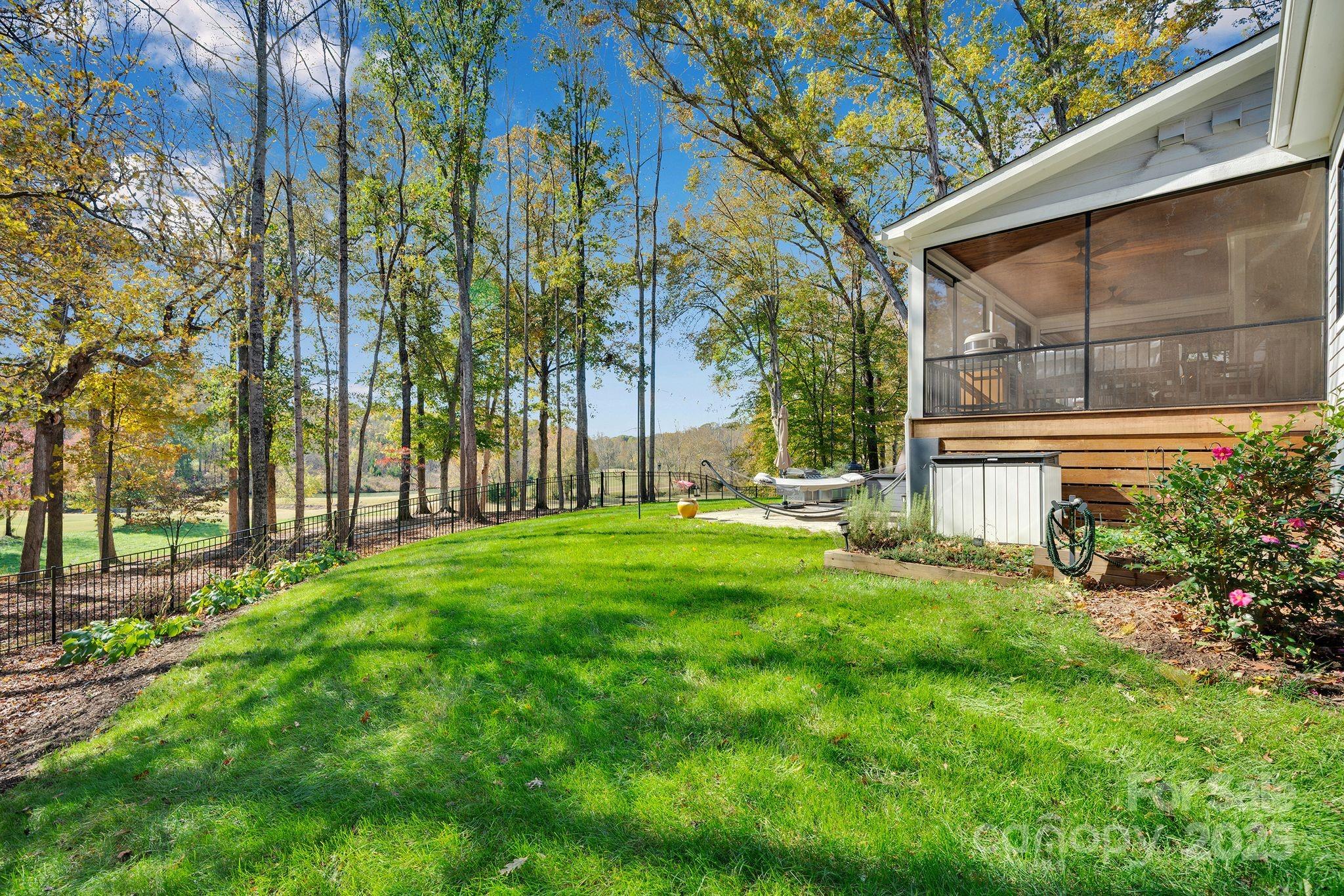 4111 Ridge Drive Northeast Conover, NC 28613 - Photo 36 of 39 a view of backyard with a garden and trees
