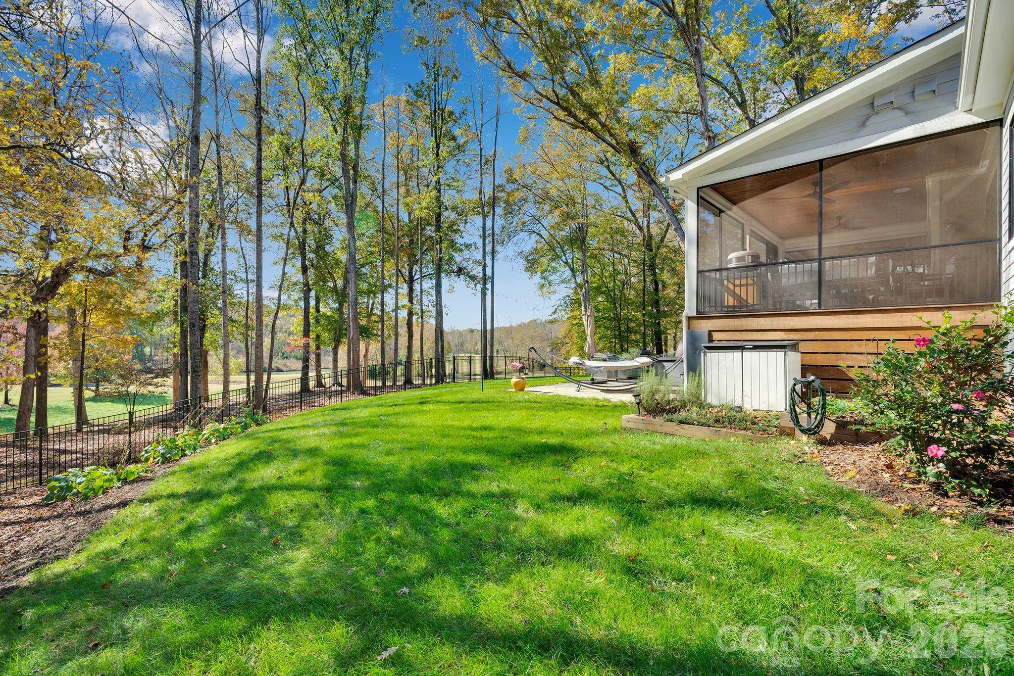 4111 Ridge Drive Northeast Conover, NC 28613 - Photo 36 of 39 a view of backyard with a garden and trees