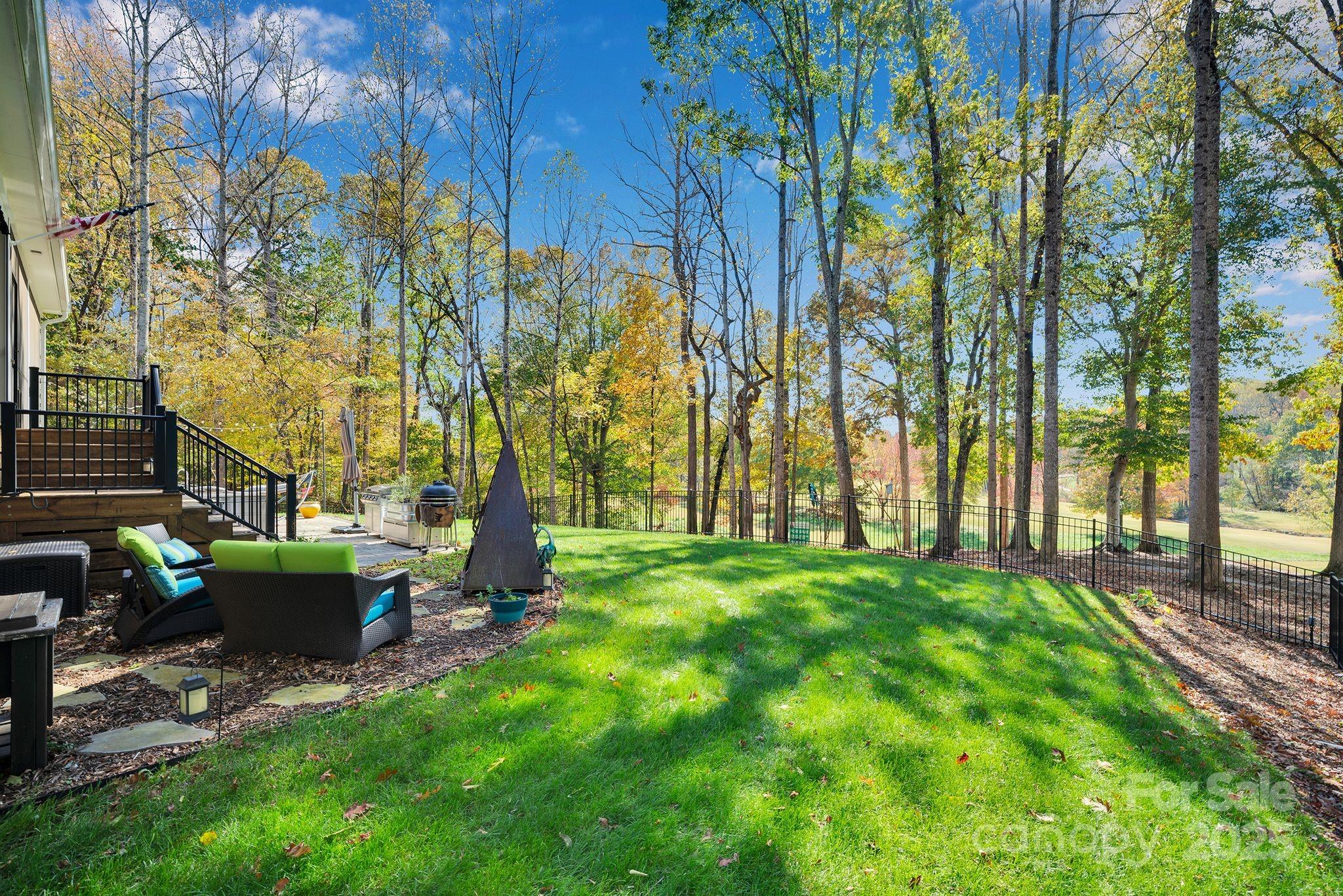 4111 Ridge Drive Northeast Conover, NC 28613 - Photo 39 of 39 a view of backyard with seating area and trees