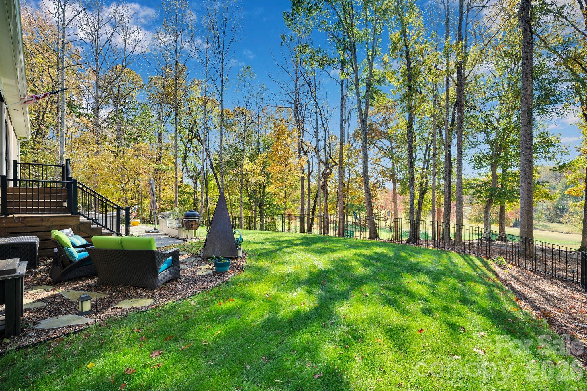 4111 Ridge Drive Northeast Conover, NC 28613 - Photo 39 of 39 a view of backyard with seating area and trees