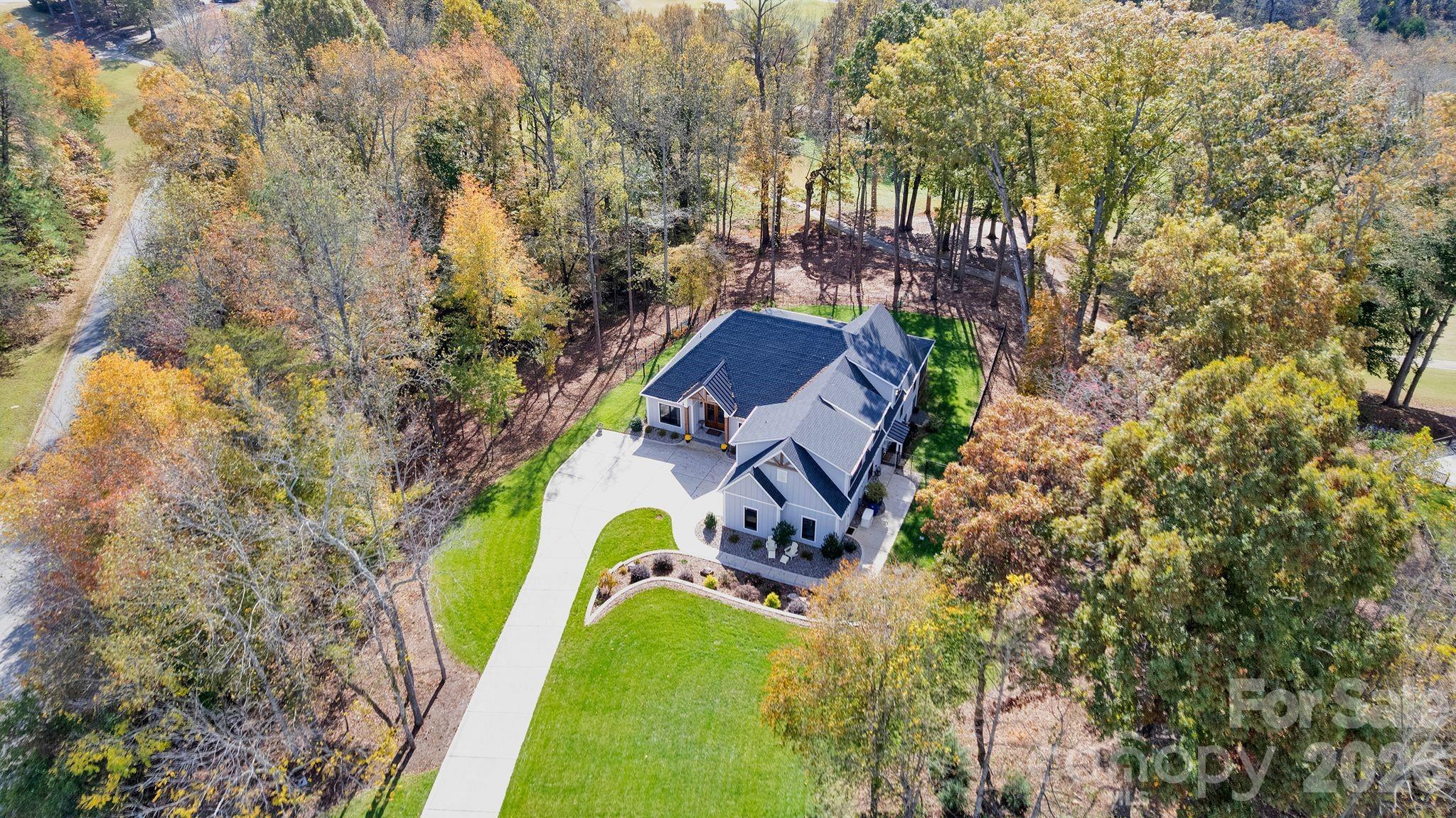 4111 Ridge Drive Northeast Conover, NC 28613 - Photo 5 of 39 an aerial view of a house with a swimming pool