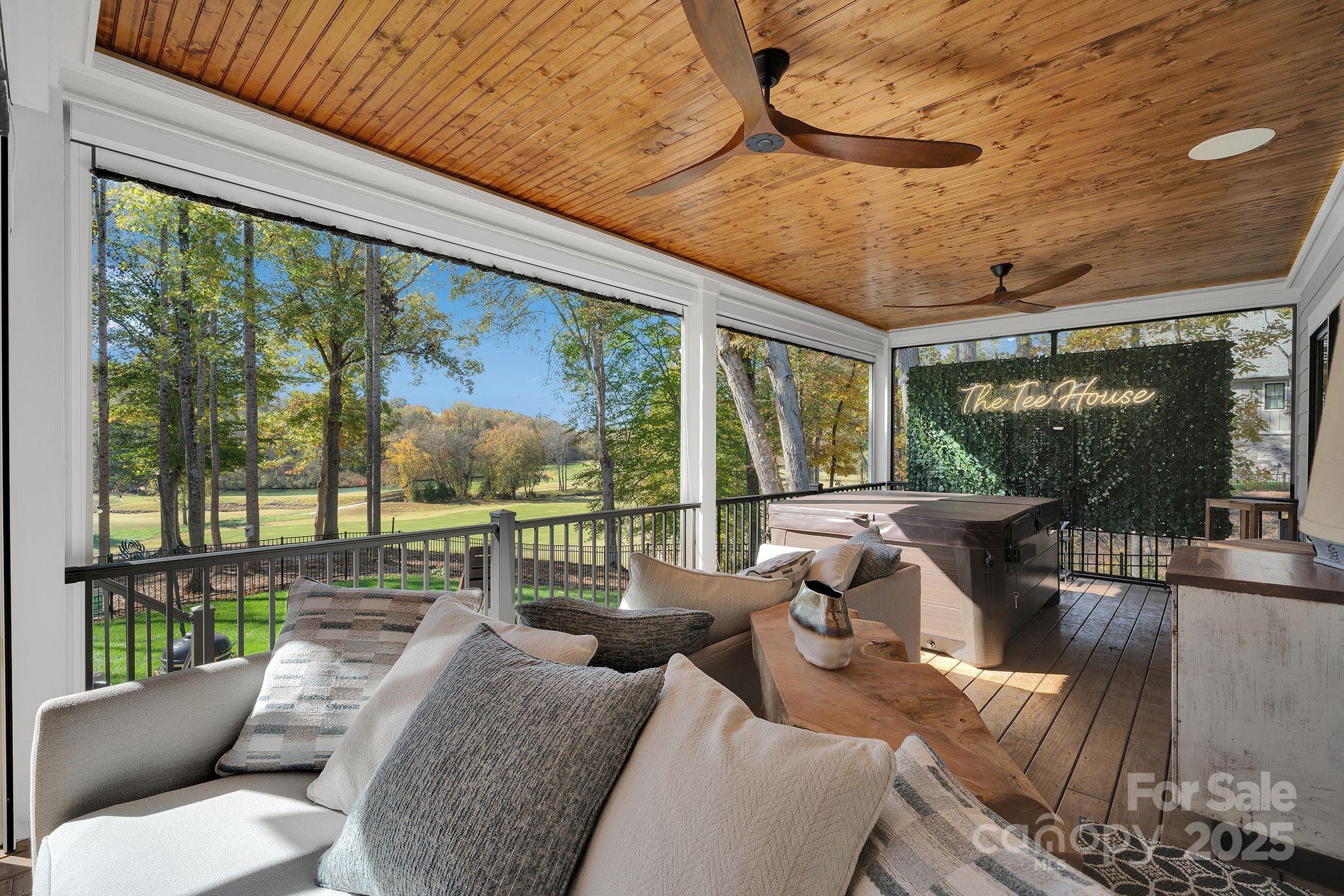 4111 Ridge Drive Northeast Conover, NC 28613 - Photo 5 of 39 a balcony with furniture and a floor to ceiling window