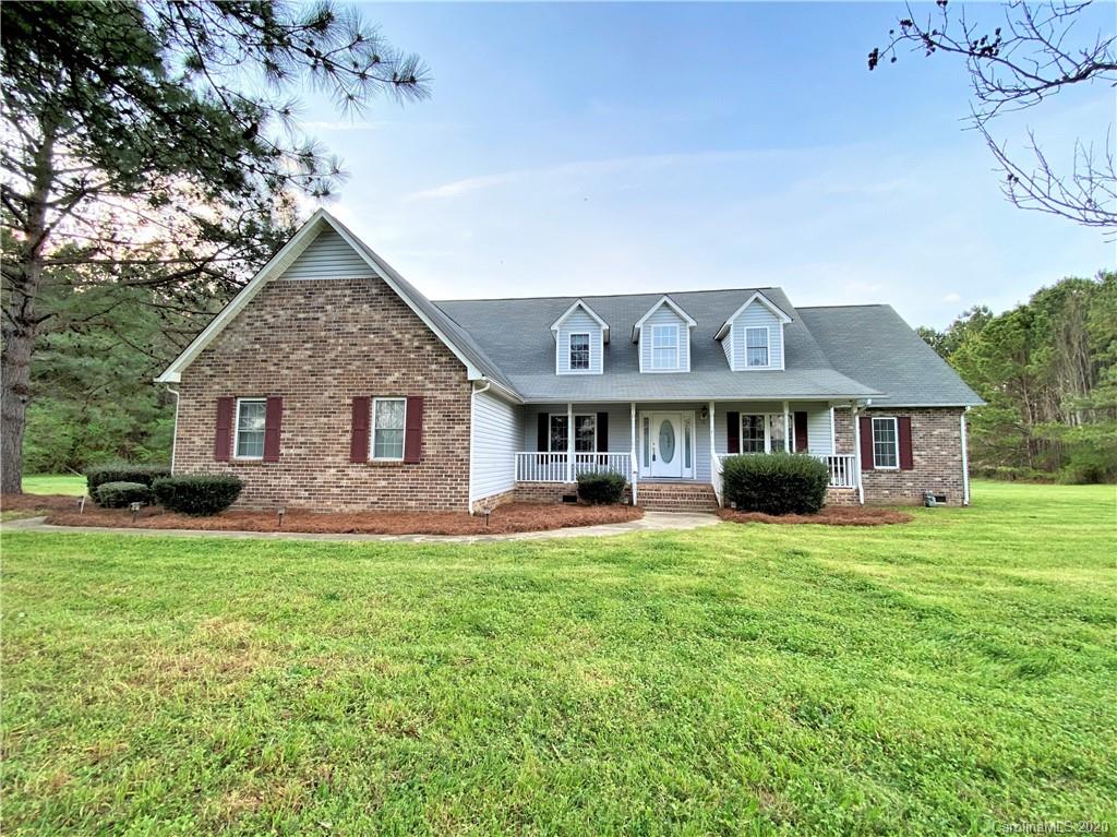 2641 Cameron Road Chester, SC 29706 - Photo 2 of 46 a front view of a house with a garden