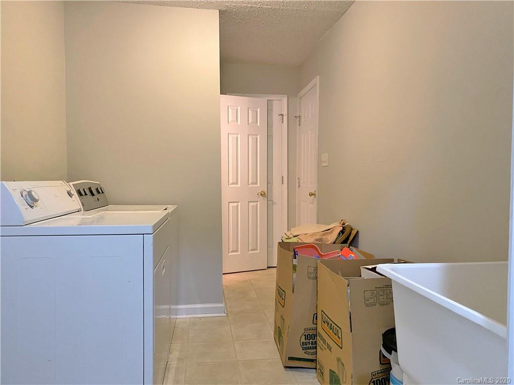 2641 Cameron Road Chester, SC 29706 - Photo 14 of 46 a utility room with dryer and washer
