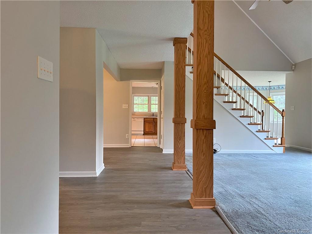2641 Cameron Road Chester, SC 29706 - Photo 28 of 46 a view of a hallway with wooden floor and staircase