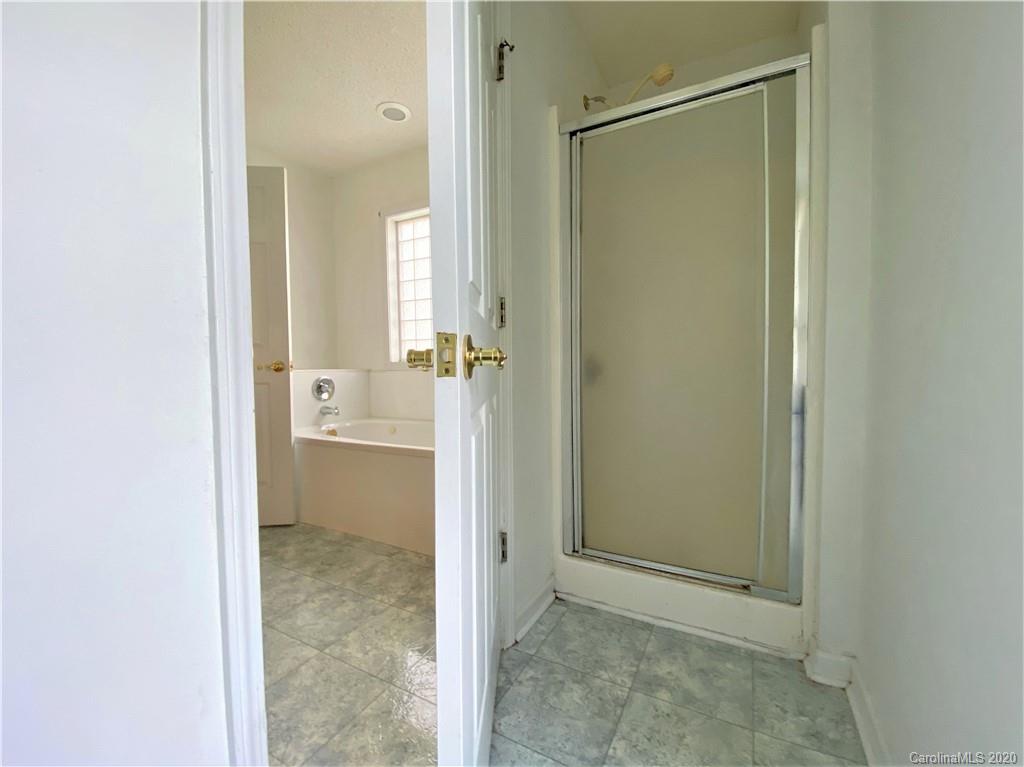 2641 Cameron Road Chester, SC 29706 - Photo 36 of 46 a view of a bathroom with a glass shower door
