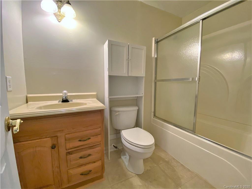 2641 Cameron Road Chester, SC 29706 - Photo 40 of 46 a bathroom with a toilet a sink and shower
