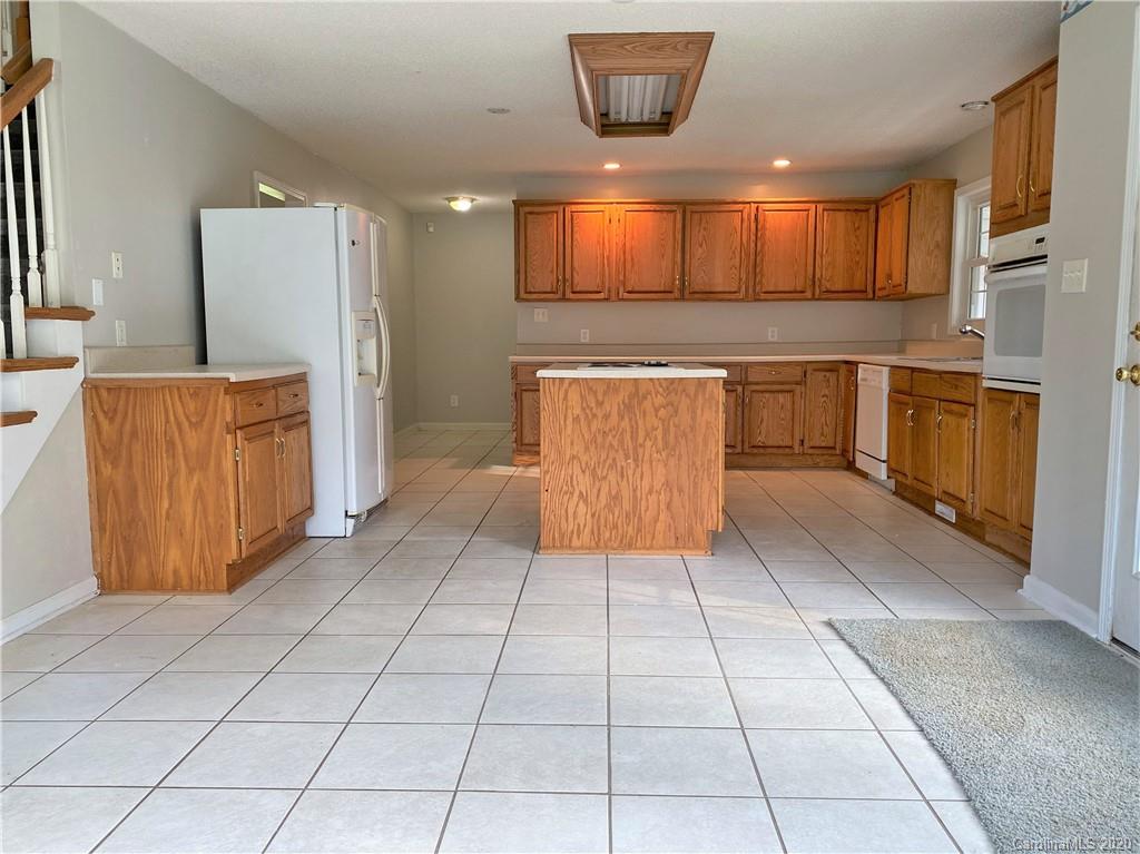 2641 Cameron Road Chester, SC 29706 - Photo 10 of 46 a kitchen with stainless steel appliances a refrigerator and microwave