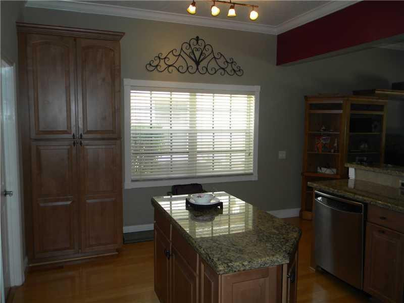 Undisclosed Address Weston, FL 33331 - Photo 10 of 23 a kitchen with granite countertop stainless steel appliances window a sink and cabinets
