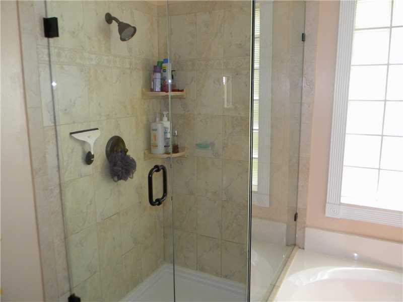 Undisclosed Address Weston, FL 33331 - Photo 13 of 23 a bathroom with a shower