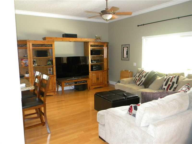 Undisclosed Address Weston, FL 33331 - Photo 19 of 23 a living room with furniture and a flat screen tv