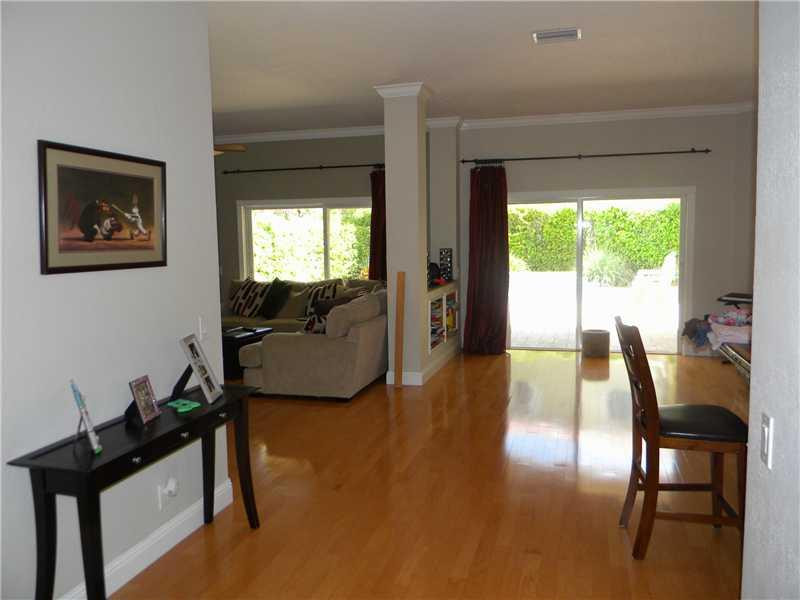 Undisclosed Address Weston, FL 33331 - Photo 23 of 23 a living room with furniture and a large window