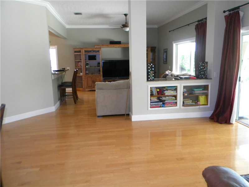Undisclosed Address Weston, FL 33331 - Photo 7 of 23 a view of living room with furniture and flat screen tv