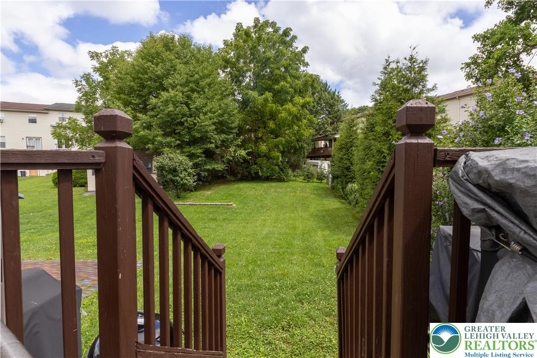 257 Ridgeview Drive Alburtis, PA 18011 - Photo 18 of 24 This backyard retreat awaits, framed by mature trees and ready for outdoor enjoyment.