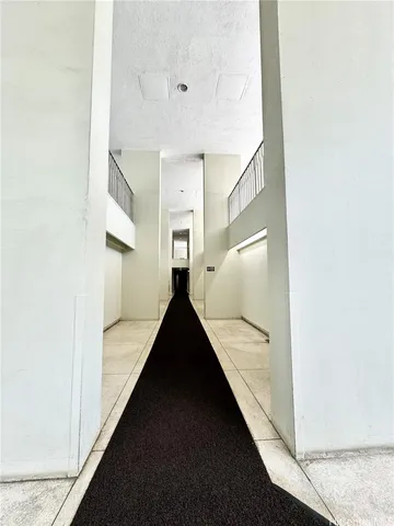 a view of hallway with stairs