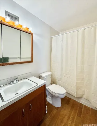 a bathroom with a sink and a toilet