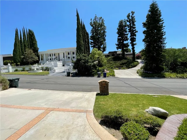 a view of a yard with an trees