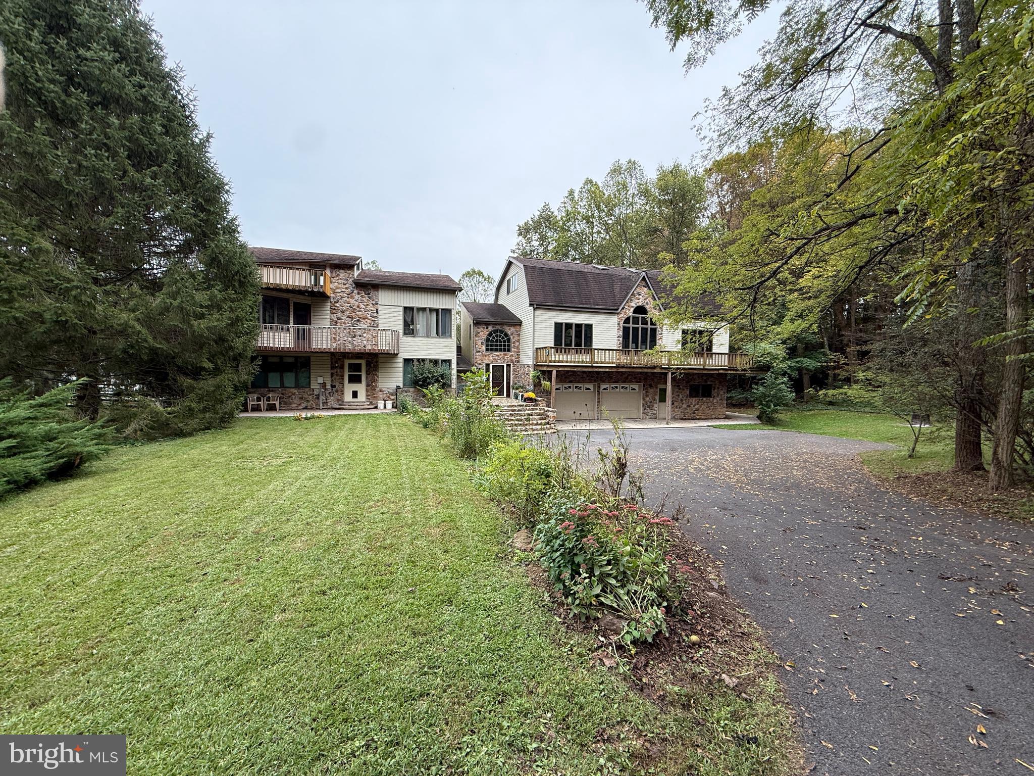 9969 Circle Drive St. Thomas, PA 17252 - Photo 26 of 81 a view of a house with a yard porch and sitting area
