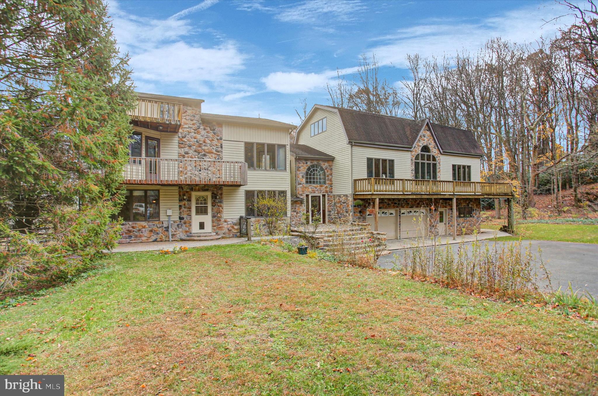 9969 Circle Drive St. Thomas, PA 17252 - Photo 3 of 81 a front view of a house with swimming pool having outdoor seating