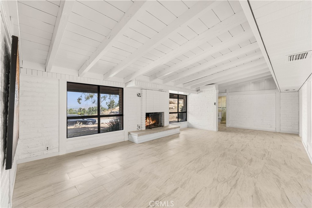 6308 Hawarden Drive Riverside, CA 92506 - Photo 8 of 37 an empty room with windows