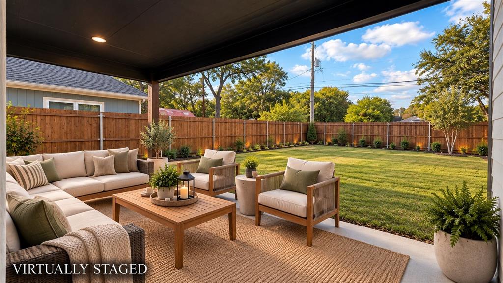 302-304 West Pine Street Whitewright, TX 75491 - Photo 35 of 38 Covered patio with recessed lighting, concrete flooring, and direct access to a fenced backyard featuring a manicured lawn and perimeter landscaping