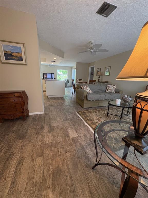 947 Shasta Road Venice, FL 34293 - Photo 28 of 52 a living room with furniture and a window
