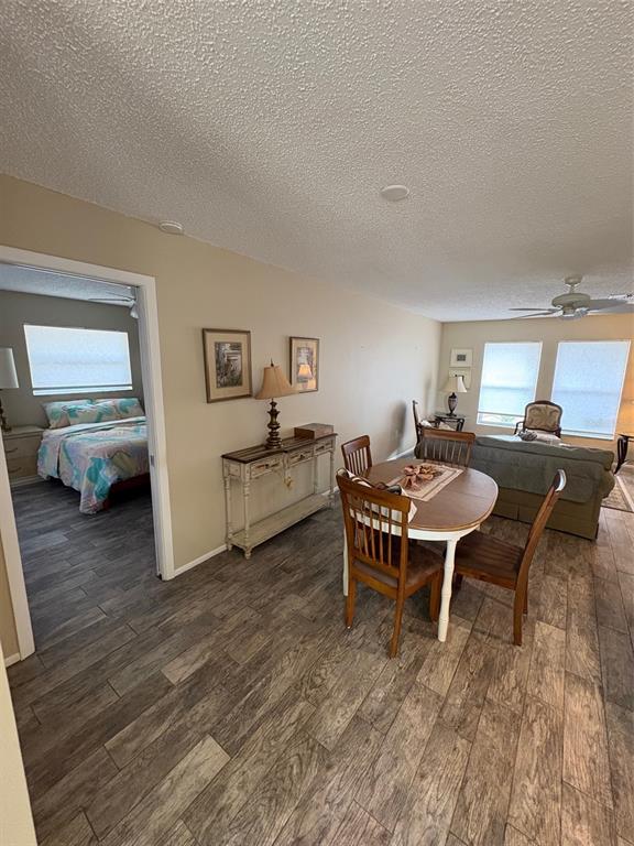 947 Shasta Road Venice, FL 34293 - Photo 30 of 52 a living room with furniture wooden floor and a table