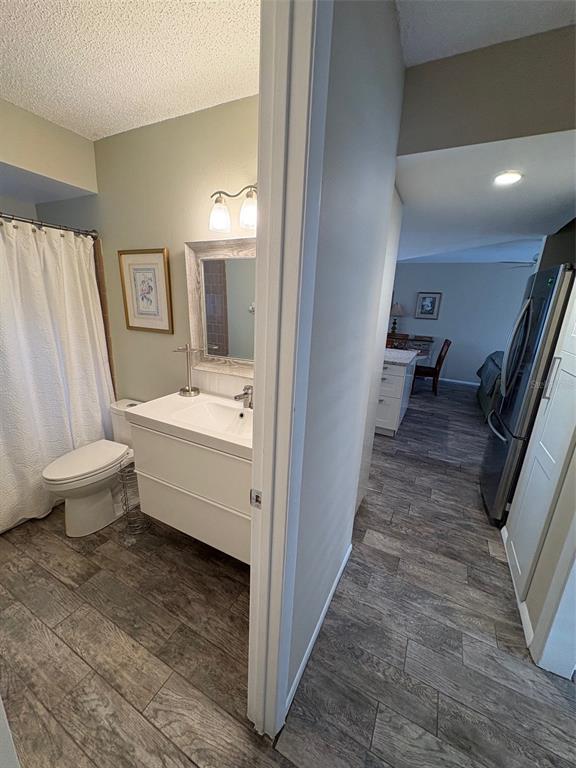 947 Shasta Road Venice, FL 34293 - Photo 39 of 52 a bathroom with a sink a toilet and a mirror