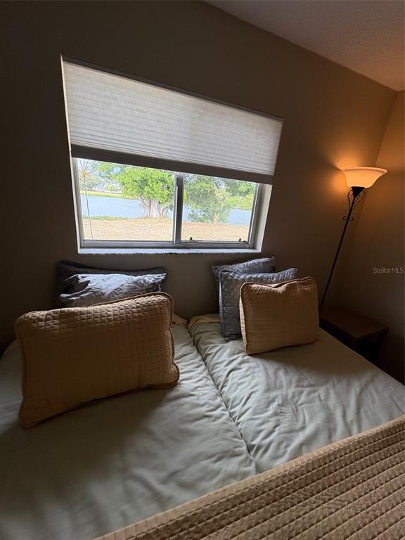 947 Shasta Road Venice, FL 34293 - Photo 43 of 52 a living room with furniture and a large window